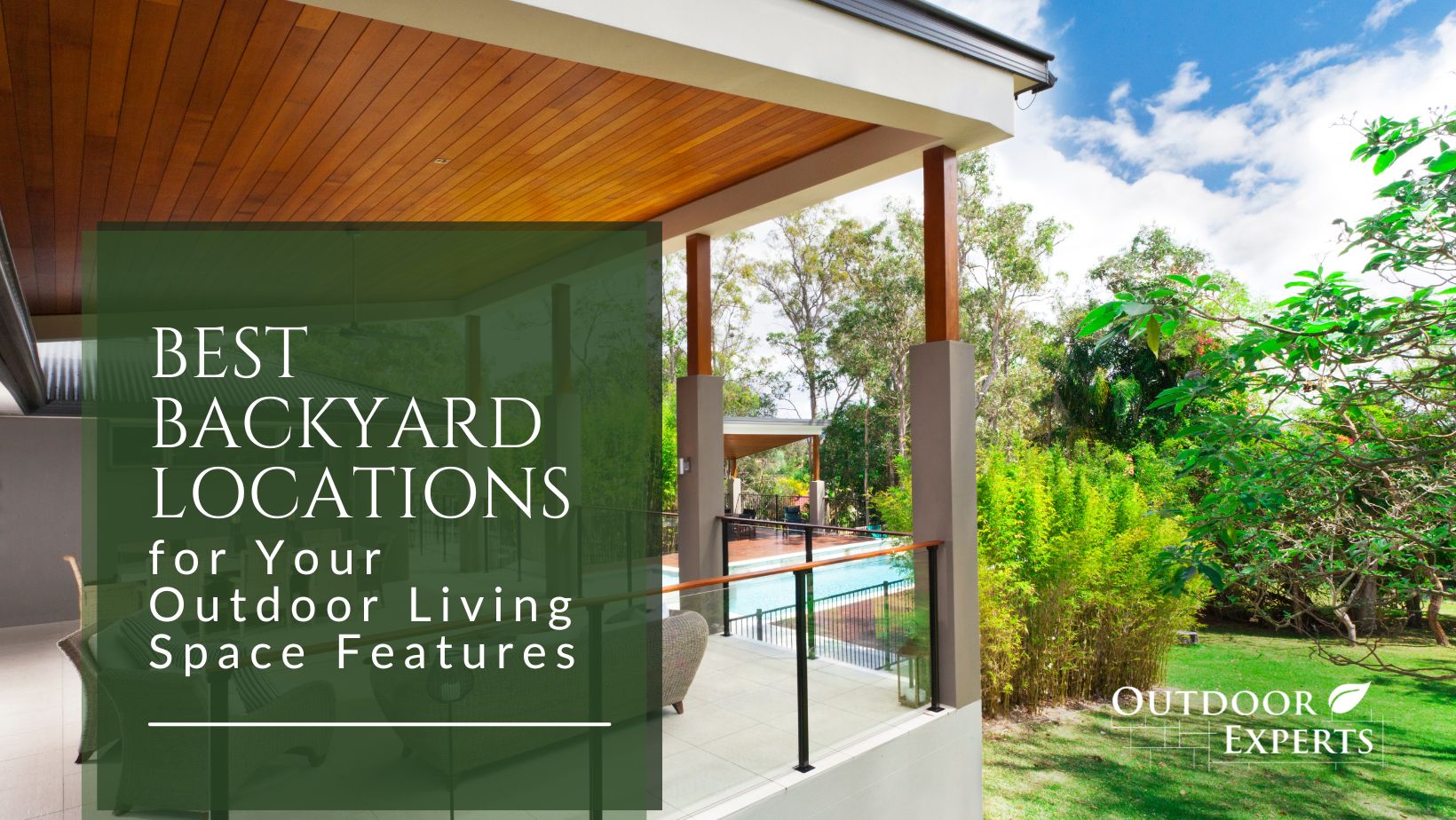 A back porch with a pool and trees in the background 